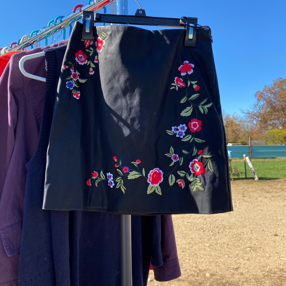 Black leather floral mini skirt